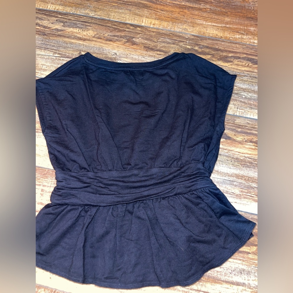 Black peplum top from anthropologie